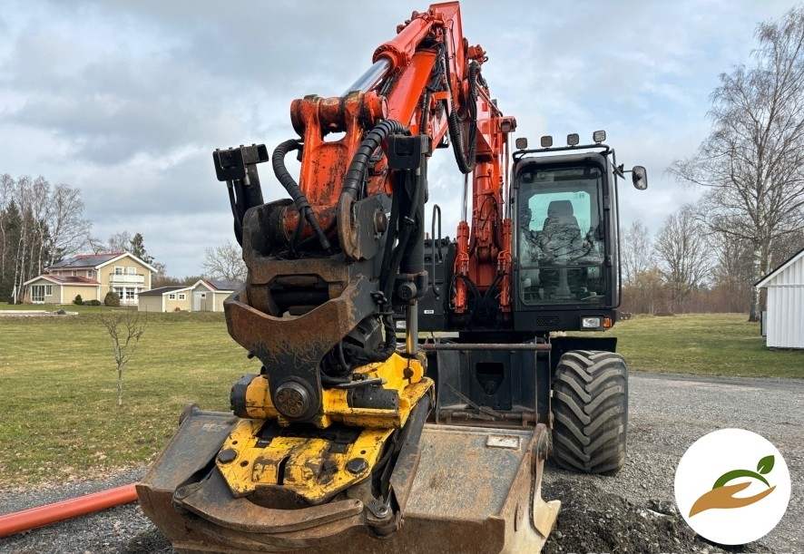 2016 Колесный экскаватор Hitachi ZX140W-5B
